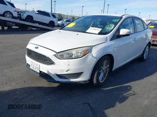 2016 Ford Focus SE with VIN 1FADP3F25GL339312, listed as a IAAI auction lot 41758115 with 77,972 mi miles. Bid and sale history available at carsss.com. Image 6.