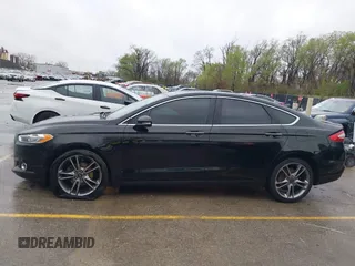 2016 Ford Fusion Titanium with VIN 3FA6P0K90GR273795, listed as a IAAI auction lot 41931175 with 108,531 mi miles and . Bid and sale history available at carsss.com. Image 14.