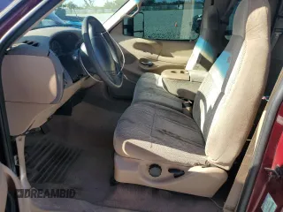 1998 Ford F-150 with VIN 1FTZX1763WNC22708, listed as a Copart auction lot 56914515 with 179,011 mi miles and Salvage title. Bid and sale history available at DreamBid. Image 7.