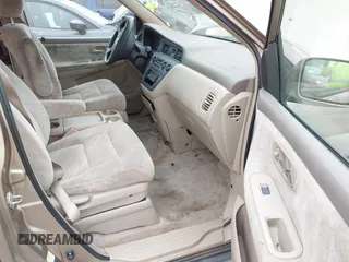 2004 Honda Odyssey EX with VIN 5FNRL18684B072343, listed as a IAAI auction lot 41945142 with 222,990 mi miles and . Bid and sale history available at DreamBid. Image 5.