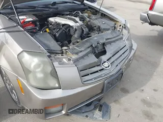 2003 Cadillac CTS with VIN 1G6DM57N730116792, listed as a IAAI auction lot 41686845 with 121,590 mi miles. Bid and sale history available at carsss.com. Image 6.