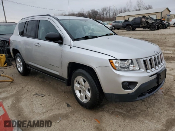 2013 Jeep Compass Sport with VIN 1C4NJCBA7DD166492, listed as a Copart auction lot 85977614 with 135,589 mi miles and Salvage Title. Bid and sale history available at carsss.com. Image 4.