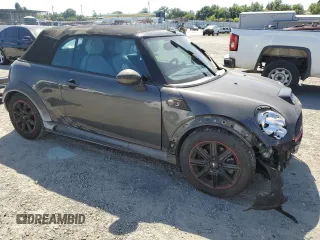 2011 MINI Convertible S с VIN WMWZP3C59BT249133, выставлен на аукционе Copart как лот 56402615 с пробегом 103 809 миль миль и Списание • Salvage title. История ставок и продаж доступна на DreamBid. Изображение 4.