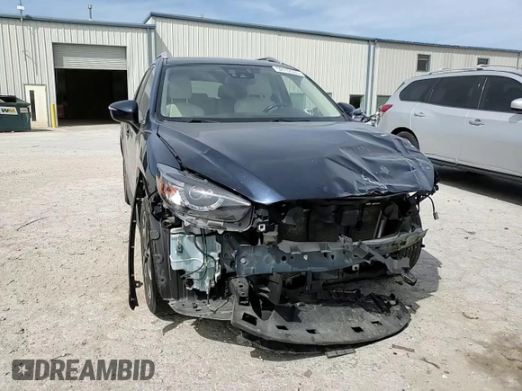 2016 Mazda CX-5 Grand Touring with VIN JM3KE4DYXG0844002, listed as a Copart auction lot 52712035 with 81,042 mi miles and Salvage Title. Bid and sale history available at DreamBid. Image 12.