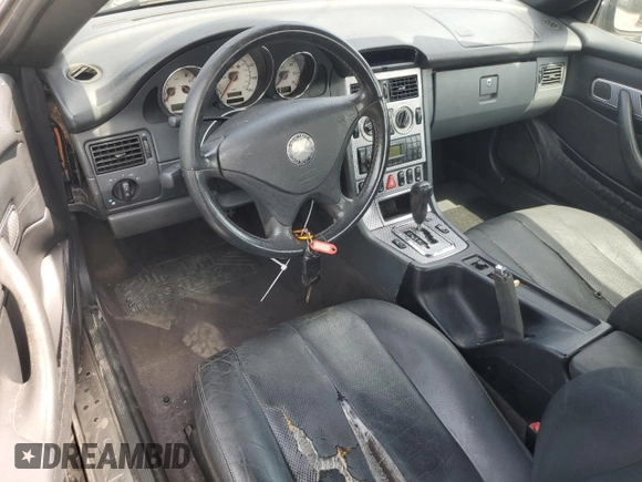 2003 Mercedes-Benz SLK 230 Kompressor with VIN WDBKK49F13F277323, listed as a Copart auction lot 53980515 with 174,276 mi miles and Salvage Title. Bid and sale history available at DreamBid. Image 8.