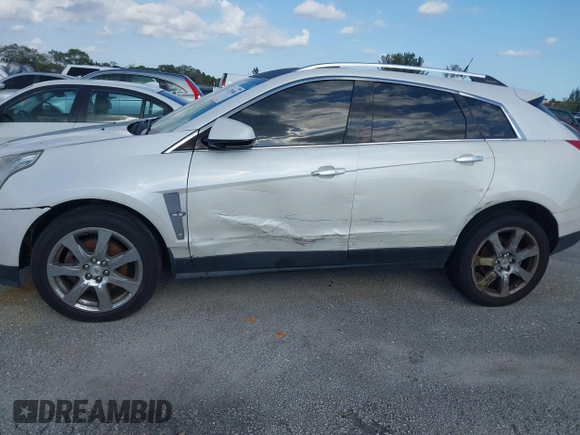 2012 Cadillac SRX Performance Collection with VIN 3GYFNEE33CS528697, listed as a IAAI auction lot 41374060 with 157,319 mi miles and . Bid and sale history available at DreamBid. Image 6.