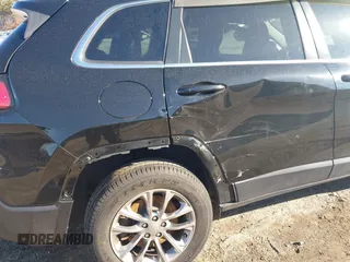 2019 Jeep Cherokee Latitude Plus with VIN 1C4PJMLB2KD261304, listed as a IAAI auction lot 41877500 with 76,442 mi miles and . Bid and sale history available at DreamBid. Image 17.