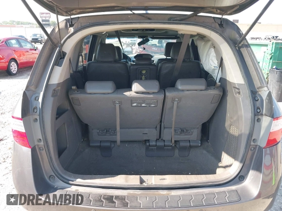 2013 Honda Odyssey Touring with VIN 5FNRL5H98DB080296, listed as a IAAI auction lot 42461843 with 104,901 mi miles and . Bid and sale history available at DreamBid. Image 16.
