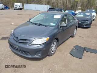 2011 Toyota Corolla L with VIN 2T1BU4EE4BC542333, listed as a IAAI auction lot 42122502 with 100,331 mi miles. Bid and sale history available at carsss.com. Image 2.