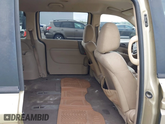 2011 Kia Sedona LX with VIN KNDMG4C71B6407306, listed as a IAAI auction lot 41922697 with 243,248 mi miles. Bid and sale history available at carsss.com. Image 8.