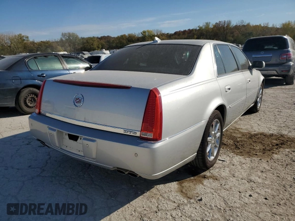 2010 Cadillac DTS w/1SC with VIN 1G6KD5EYXAU126775, listed as a Copart auction lot 77207094 with 100,288 mi miles and Salvage Title. Bid and sale history available at carsss.com. Image 3.