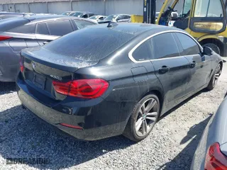 2019 BMW 4 Series 430i with VIN WBA4J1C59KBM16385, listed as a IAAI auction lot 41708630 with 97,993 mi miles. Bid and sale history available at carsss.com. Image 4.