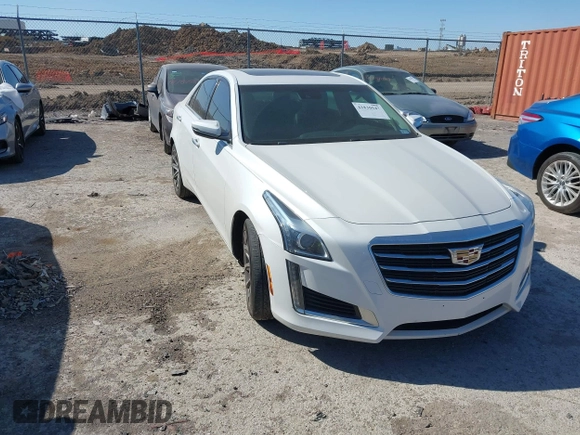 2016 Cadillac CTS with VIN 1G6AR5SS1G0112728, listed as a IAAI auction lot 41830547 with 100,610 mi miles and . Bid and sale history available at DreamBid. Image 1.