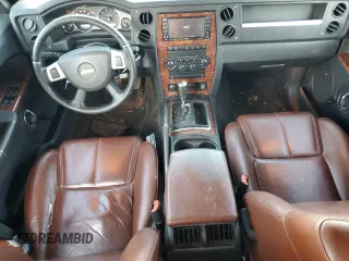2008 Jeep Commander Limited with VIN 1J8HH58N98C236772, listed as a Copart auction lot 71042404 with 217,780 mi miles and Salvage Title. Bid and sale history available at carsss.com. Image 8.
