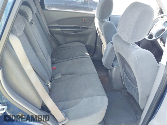 2008 Hyundai Tucson SE with VIN KM8JN12D48U860172, listed as a IAAI auction lot 42152650 with 220,573 mi miles. Bid and sale history available at carsss.com. Image 8.