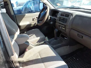 1999 Mitsubishi Montero Sport LS with VIN JA4LS31H4XP024827, listed as a IAAI auction lot 41652278 with 1 mi miles. Bid and sale history available at carsss.com. Image 5.