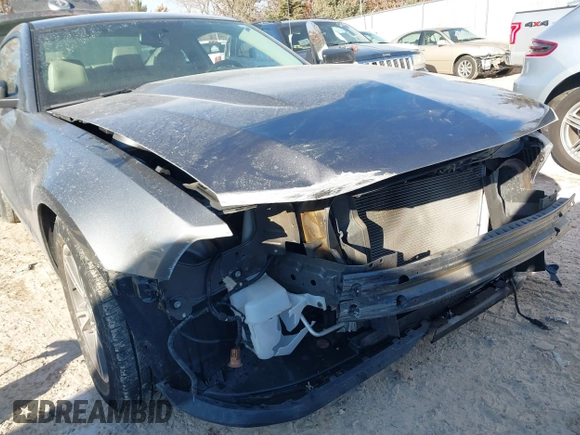 2011 Ford Mustang V6 with VIN 1ZVBP8AMXB5123084, listed as a IAAI auction lot 41359860 with 123,589 mi miles and . Bid and sale history available at carsss.com. Image 6.