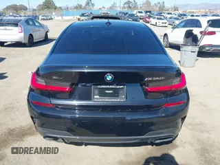 2021 BMW 3 Series M340i xDrive with VIN 3MW5U9J0XM8B49022, listed as a IAAI auction lot 41637152 with 65,452 mi miles. Bid and sale history available at carsss.com. Image 16.