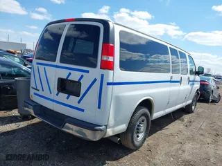 2017 Chevrolet Express Passenger LT with VIN 1GAZGPFF4H1242182, listed as a IAAI auction lot 42020122 with 51,100 mi miles. Bid and sale history available at carsss.com. Image 4.