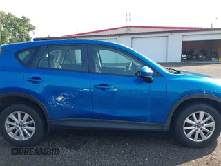 2014 Mazda CX-5 Sport z VIN JM3KE4BE7E0351982, wystawiony jako IAAI lot #42767499 z przebiegiem 154 774 mil mil oraz . Historia ofert i sprzedaży dostępna na DreamBid. Obrazek 13.