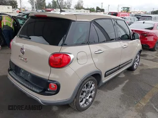 2014 FIAT 500L Trekking with VIN ZFBCFADHXEZ015287, listed as a IAAI auction lot 42063297 with 81,858 mi miles and . Bid and sale history available at DreamBid. Image 4.