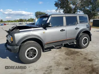 2022 Ford Bronco with VIN 1FMEE5DH1NLB82717, listed as a Copart auction lot 83230614 with 21,593 mi miles and Salvage Title. Bid and sale history available at DreamBid. Image 1.