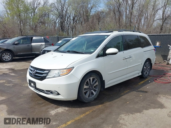 2014 Honda Odyssey Touring с VIN 5FNRL5H94EB057681, выставлен на аукционе IAAI как лот 41828000 с пробегом 249 350 миль миль и . История ставок и продаж доступна на DreamBid. Изображение 18.