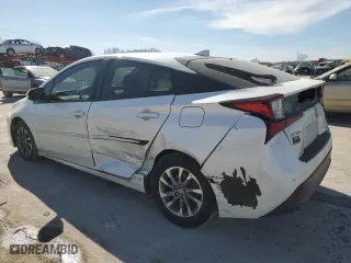 2021 Toyota Prius L Eco with VIN JTDKAMFU5M3133915, listed as a Copart auction lot 47015075 with 56,133 mi miles and Salvage Title. Bid and sale history available at carsss.com. Image 2.