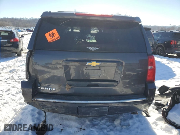 2015 Chevrolet Tahoe LTZ z VIN 1GNSKCKC8FR223832, wystawiony jako Copart lot #87023514 z przebiegiem Nie podano mil oraz Szkoda całkowita • Salvage title. Historia ofert i sprzedaży dostępna na DreamBid. Obrazek 6.