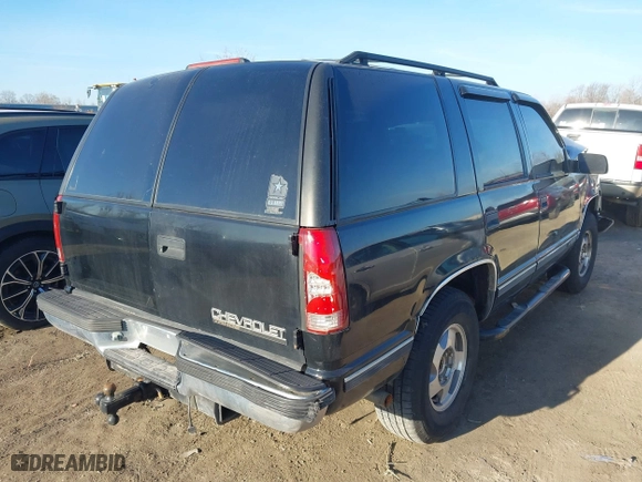 1996 Chevrolet Tahoe with VIN 1GNEK13RXTJ418622, listed as a IAAI auction lot 41879760 with 349,211 mi miles. Bid and sale history available at carsss.com. Image 4.