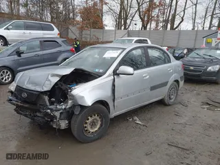 2009 Kia Rio with VIN KNADE223296504398, listed as a IAAI auction lot 41673028 with NaN miles. Bid and sale history available at carsss.com. Image 18.