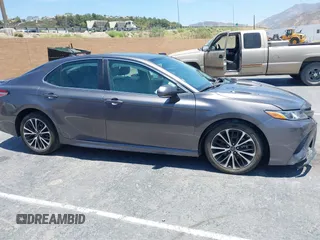2019 Toyota Camry LE z VIN 4T1B11HK5KU833141, wystawiony jako IAAI lot #42489827 z przebiegiem 24 258 mil mil oraz . Historia ofert i sprzedaży dostępna na DreamBid. Obrazek 13.