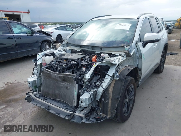 2022 Toyota RAV4 Hybrid SE with VIN 4T3T6RFV4NU065150, listed as a IAAI auction lot 42166772 with 69,868 mi miles and . Bid and sale history available at DreamBid. Image 18.