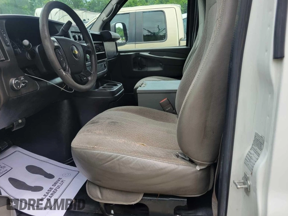 2012 Chevrolet Express Cargo with VIN 1GCWGFCA4C1182538, listed as a IAAI auction lot 42205703 with 235,660 mi miles. Bid and sale history available at carsss.com. Image 1.