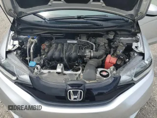 2015 Honda Fit LX z VIN 3HGGK5H51FM729802, wystawiony jako Copart lot #59997735 z przebiegiem 38 776 mil mil oraz Szkoda całkowita • Salvage title. Historia ofert i sprzedaży dostępna na DreamBid. Obrazek 11.