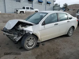 2010 Ford Focus SE with VIN 1FAHP3FN9AW248772, listed as a Copart auction lot 44965245 with 128,450 mi miles and Salvage Title. Bid and sale history available at carsss.com. Image 1.