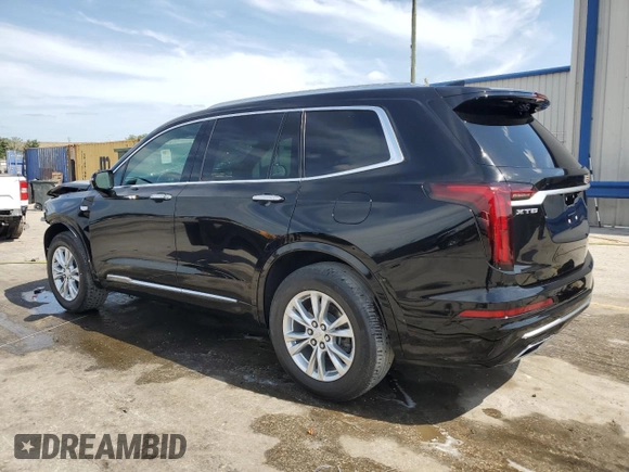 2023 Cadillac XT6 FWD Luxury z VIN 1GYKPAR45PZ187400, wystawiony jako Copart lot #54562335 z przebiegiem 16 953 mil mil oraz Szkoda całkowita • Salvage title. Historia ofert i sprzedaży dostępna na DreamBid. Obrazek 2.