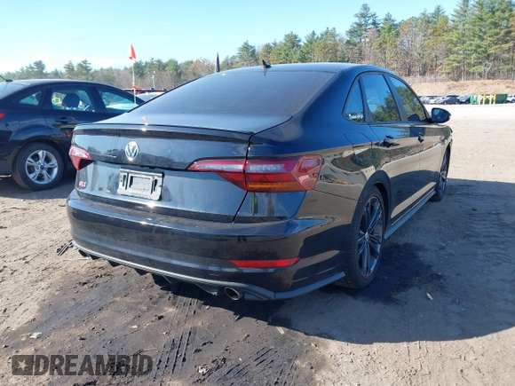 2019 Volkswagen Jetta GLI S z VIN 3VW5T7BU1KM156888, wystawiony jako IAAI lot #40778065 z przebiegiem 97 114 mil mil oraz . Historia ofert i sprzedaży dostępna na DreamBid. Obrazek 4.