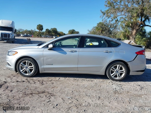 2018 Ford Fusion Hybrid S with VIN 3FA6P0UU8JR244912, listed as a IAAI auction lot 41742940 with 65,885 mi miles. Bid and sale history available at carsss.com. Image 14.