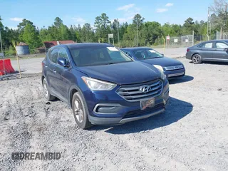 2018 Hyundai Santa Fe 2.4L z VIN 5XYZTDLBXJG527865, wystawiony jako IAAI lot #42062756 z przebiegiem 190 877 mil mil oraz . Historia ofert i sprzedaży dostępna na DreamBid. Obrazek 1.