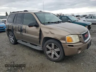 2003 GMC Envoy SLE with VIN 1GKDT13S432263407, listed as a Copart auction lot 44025825 with 154,266 mi miles and Salvage Title. Bid and sale history available at carsss.com. Image 4.