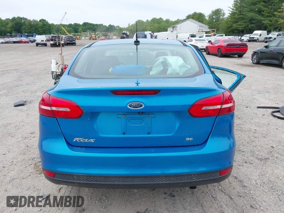 2015 Ford Focus SE z VIN 1FADP3F26FL252212, wystawiony jako IAAI lot #42345763 z przebiegiem 102 549 mil mil oraz . Historia ofert i sprzedaży dostępna na DreamBid. Obrazek 16.