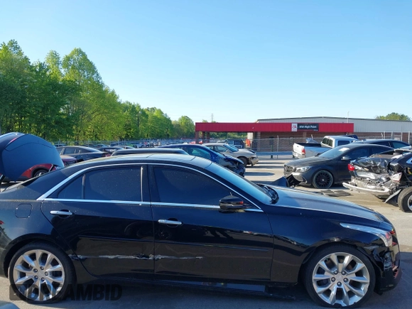 2015 Cadillac CTS Premium AWD with VIN 1G6AZ5S35F0129572, listed as a IAAI auction lot 42045670 with 62,758 mi miles and . Bid and sale history available at DreamBid. Image 13.