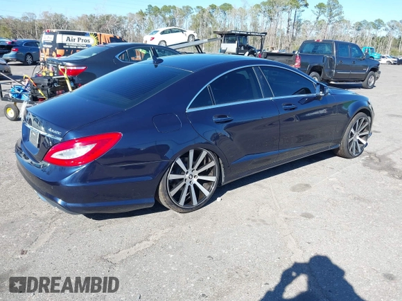 2013 Mercedes-Benz CLS-Class CLS 550 with VIN WDDLJ9BB7DA074616, listed as a IAAI auction lot 41750371 with 112,898 mi miles. Bid and sale history available at carsss.com. Image 4.