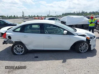 2018 Ford Focus SE with VIN 1FADP3F29JL213008, listed as a IAAI auction lot 41790224 with 85,056 mi miles and . Bid and sale history available at DreamBid. Image 14.