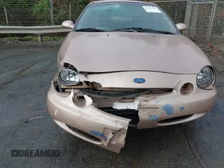 1997 Ford Taurus GL z VIN 1FALP52U2VA273762, wystawiony jako IAAI lot #41956536 z przebiegiem 177 340 mil mil oraz . Historia ofert i sprzedaży dostępna na DreamBid. Obrazek 6.