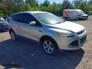 2014 Ford Escape SE with VIN 1FMCU0GX4EUD22334, listed as a IAAI auction lot 42007641 with 146,573 mi miles. Bid and sale history available at carsss.com. Image 1.