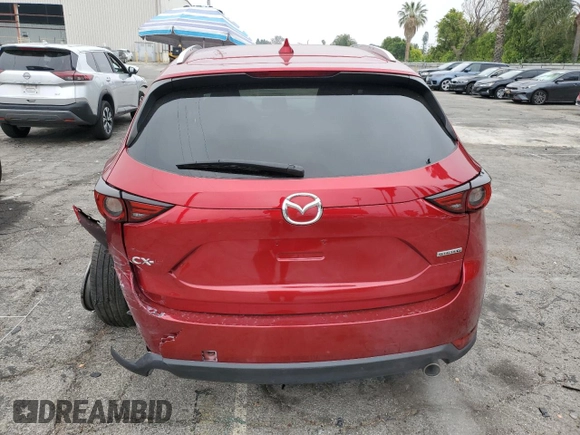 2020 Mazda CX-5 Grand Touring with VIN JM3KFADM1L1837775, listed as a Copart auction lot 55314595 with 82,359 mi miles and Clean Title. Bid and sale history available at DreamBid. Image 6.