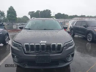 2019 Jeep Cherokee Latitude Plus with VIN 1C4PJMLB7KD195591, listed as a IAAI auction lot 42433607 with 58,370 mi miles and . Bid and sale history available at DreamBid. Image 12.