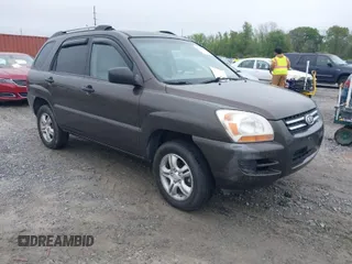 2006 Kia Sportage LX with VIN KNDJF723567155128, listed as a IAAI auction lot 41932344 with 118,519 mi miles and . Bid and sale history available at carsss.com. Image 1.
